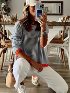 Genimah | Gestreept Sweatshirt met Oranje Details